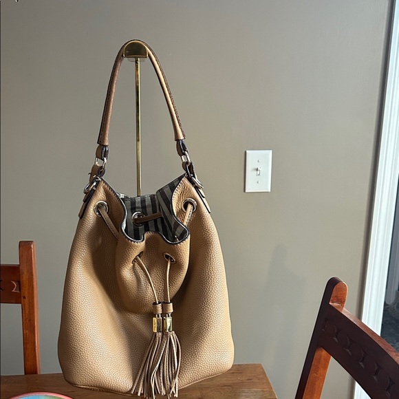 henri bendel Handbags - Henri Bendel Vintage Tan Leather Two Way Bucket Bag Striped Interior in EUC